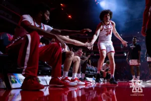 Nebraska Cornhusker Braxton Meah (34) giving fives when introduced during a college men’s basketball game Thursday, October 27, 2024, in Lincoln, Nebraska. Photo by John S. Peterson.