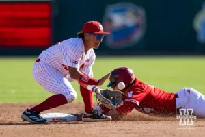 Nebraska Harvester Joshua Overbeek (4) beats the tag at second against Nebraska Bugeater Devin Nunez (43) during a baseball scrimmage Tuesday, October 15, 2024, in Lincoln, Nebraska. Photo by John S. Peterson.