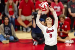 Nebraska Cornhusker Bergen Reilly (2) sets the ball against the Purdue Boilermakers during a college volleyball match Friday, October 11, 2024, in Lincoln, Nebraska. Photo by John S. Peterson.