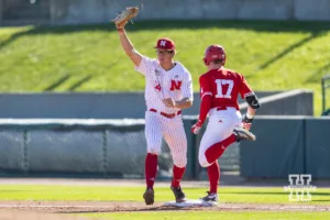 Nebraska's Case Sanderson (14) makes a out against Nebraska's Hayden Lewis (17) in the second inning during a baseball scrimmage Tuesday, October 15, 2024, in Lincoln, Nebraska. Photo by John S. Peterson.