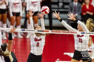 Nebraska Cornhusker Bergen Reilly (2) and Andi Jackson jump to block against the Purdue Boilermakers during a college volleyball match Friday, October 11, 2024, in Lincoln, Nebraska. Photo by John S. Peterson.