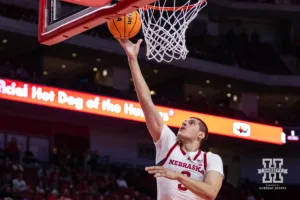 Nebraska Cornhusker Brice Williams (3) makes a layup against the Grand Valley State Lakers in the first half during a college men’s basketball game Thursday, October 27, 2024, in Lincoln, Nebraska. Photo by John S. Peterson.