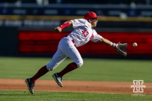 Nebraska's Devin Nunez (43) tosses the ball with his glove to first during a baseball scrimmage Tuesday, October 15, 2024, in Lincoln, Nebraska. Photo by John S. Peterson.