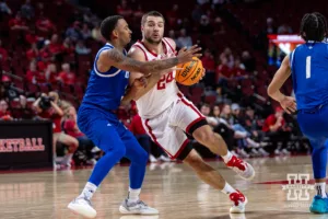 Nebraska Cornhusker Rollie Worster (24) drives to the basket against Grand Valley State Laker Mason Docks (3) in the first half during a college men’s basketball game Thursday, October 27, 2024, in Lincoln, Nebraska. Photo by John S. Peterson.