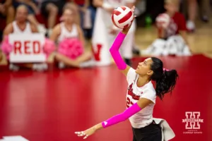 Nebraska Cornhusker Harper Murray (27) spikes the ball against the Rutgers Scarlet Knights during a college volleyball match Saturday, October 12, 2024, in Lincoln, Nebraska. Photo by John S. Peterson.