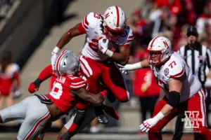 Nebraska Cornhusker running back Dante Dowdell (23) runs with the ball against Ohio State Buckeye safety Jaylen McClain (18) during a college football game Saturday, October 26, 2024, in Columbus, Ohio. Photo by John S. Peterson.