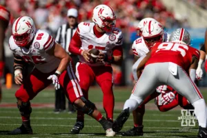 Nebraska Cornhusker quarterback Dylan Raiola (15) takes the snap against the Ohio State Buckeyes during a college football game Saturday, October 26, 2024, in Columbus, Ohio. Photo by John S. Peterson.