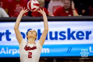 Nebraska Cornhusker Bergen Reilly (2) sets the ball against the Rutgers Scarlet Knights during a college volleyball match Saturday, October 12, 2024, in Lincoln, Nebraska. Photo by John S. Peterson.