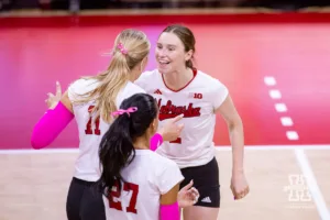 Nebraska Cornhusker Bergen Reilly (2) celebrates with Leyla Blackwell against the Rutgers Scarlet Knights during a college volleyball match Saturday, October 12, 2024, in Lincoln, Nebraska. Photo by John S. Peterson.