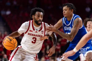 Nebraska Cornhusker Brice Williams (3) drives to the lane against Grand Valley State Laker Shamus Thompson (15) in the second half during a college men’s basketball game Thursday, October 27, 2024, in Lincoln, Nebraska. Photo by John S. Peterson.