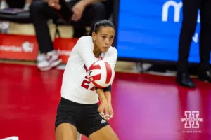 Nebraska Cornhusker Harper Murray (27) digs the ball against the Purdue Boilermakers during a college volleyball match Friday, October 11, 2024, in Lincoln, Nebraska. Photo by John S. Peterson.