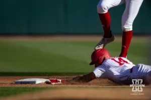 Nebraska's Case Sanderson (14) slide to second during a baseball scrimmage Tuesday, October 15, 2024, in Lincoln, Nebraska. Photo by John S. Peterson.