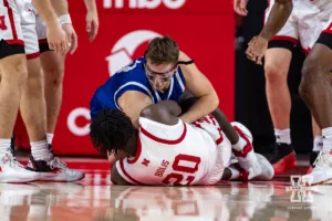 Nebraska Cornhusker Justin Bolis (20) fights for the ball against the Grand Valley State Lakers in the second half during a college men’s basketball game Thursday, October 27, 2024, in Lincoln, Nebraska. Photo by John S. Peterson.