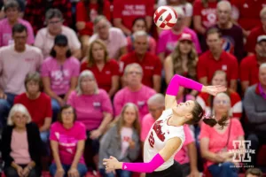 Nebraska Cornhusker Lindsay Krause (22) spikes the ball against the Rutgers Scarlet Knights during a college volleyball match Saturday, October 12, 2024, in Lincoln, Nebraska. Photo by John S. Peterson.