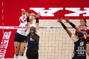 Nebraska Cornhusker Rebekah Allick (5) spikes the ball against the Purdue Boilermakers during a college volleyball match Friday, October 11, 2024, in Lincoln, Nebraska. Photo by John S. Peterson.