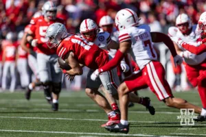 Ohio State Buckeye quarterback Will Howard (18) scrambles against the Nebraska Cornhuskers in the fourth quarter during a college football game Saturday, October 26, 2024, in Columbus, Ohio. Photo by John S. Peterson.