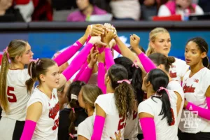 Nebraska Cornhuskers huddle up after the win over the Rutgers Scarlet Knights during a college volleyball match Saturday, October 12, 2024, in Lincoln, Nebraska. Photo by John S. Peterson.