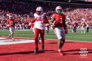 Ohio State Buckeye running back Quinshon Judkins (1) makes a catch against Nebraska Cornhusker linebacker Mikai Gbayor (42) for a touchdown in the fourth quarter to take the lead against the Nebraska Cornhuskersduring a college football game Saturday, October 26, 2024, in Columbus, Ohio. Photo by John S. Peterson.