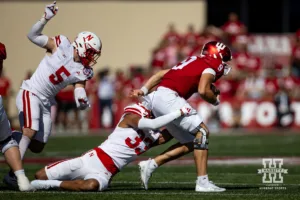 Nebraska Cornhusker linebacker Javin Wright (33) tackles Indiana Hoosier quarterback Kurtis Rourke (9) during a football game Saturday, October 19, 2024, in Bloomington, Indiana. Photo by John S. Peterson.