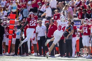 Indiana Hoosier defensive back Jamari Sharpe (22) breaks up a pass to Nebraska Cornhusker wide receiver Alex Bullock (84) during a football game Saturday, October 19, 2024, in Bloomington, Indiana. Photo by John S. Peterson.