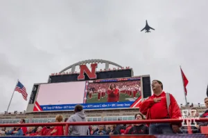 A B1 bomber flys over during the National Anthem before the Nebraska Cornhuskers take on the UCLA Bruins in a college football game Saturday, November 2, 2024, in Lincoln, Nebraska. Photo by John S. Peterson.