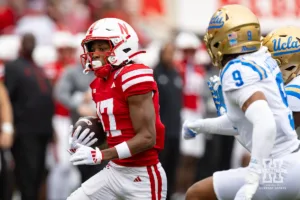 Nebraska Cornhusker wide receiver Jacory Barney Jr. (17) runs with the ball against UCLA Bruin defensive back Kaylin Moore (9) in the second quarter during a college football game Saturday, November 2, 2024, in Lincoln, Nebraska. Photo by John S. Peterson.