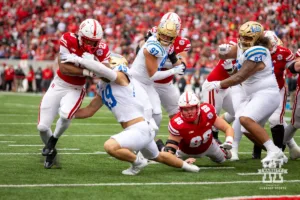 Nebraska Cornhusker running back Dante Dowdell (23) scores a touchdown in the second quarter against UCLA Bruin linebacker Carson Schwesinger (49) during a college football game Saturday, November 2, 2024, in Lincoln, Nebraska. Photo by John S. Peterson.