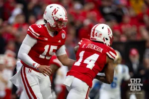 Nebraska Cornhusker quarterback Dylan Raiola (15) hands the ball off to running back Rahmir Johnson (14) in the second quarter during a college football game Saturday, November 2, 2024, in Lincoln, Nebraska. Photo by John S. Peterson.