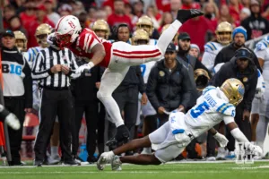 Nebraska Cornhusker running back Dante Dowdell (23) hurdles UCLA Bruin defensive back Jaylin Davies (6) while running with the ball in the third quarter during a college football game Saturday, November 2, 2024, in Lincoln, Nebraska. Photo by John S. Peterson.