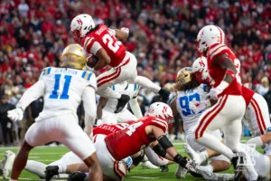 Nebraska Cornhusker running back Dante Dowdell (23) dives over the line to score a touchdown against the UCLA Bruins in the fourth quarter during a college football game Saturday, November 2, 2024, in Lincoln, Nebraska. Photo by John S. Peterson.