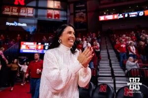 Nebraska Cornhusker head coach Amy Williams makes her way out to the court to take on the Omaha Mavericks during a college women’s basketball game on Tuesday, Dec. 9, 2025, in Lincoln, Nebraska. Photo by John S. Peterson.